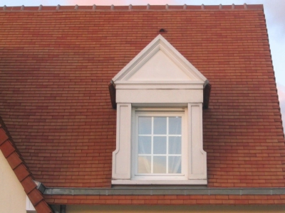 Lucarne à fronton triangulaire